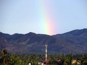 Melaque rainbow over the mountains